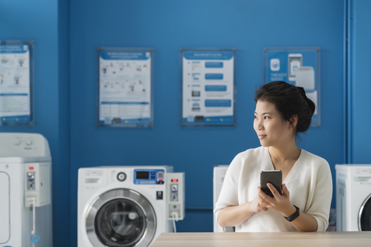 Customer checking laundry queue on Wafi Laundry app